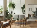 Salotto con divano grigio, poltrone in legno e tante piante. Un angolo che evoca uno stile jungle chic, con un'atmosfera rilassante e naturale.