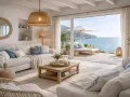 Accogliente salotto casa al mare con divani chiari, tavolino in legno e vista panoramica sull'oceano.