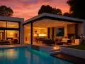 Un tramonto infuocato illumina queste case bellissime con piscina, camino e arredi esterni.