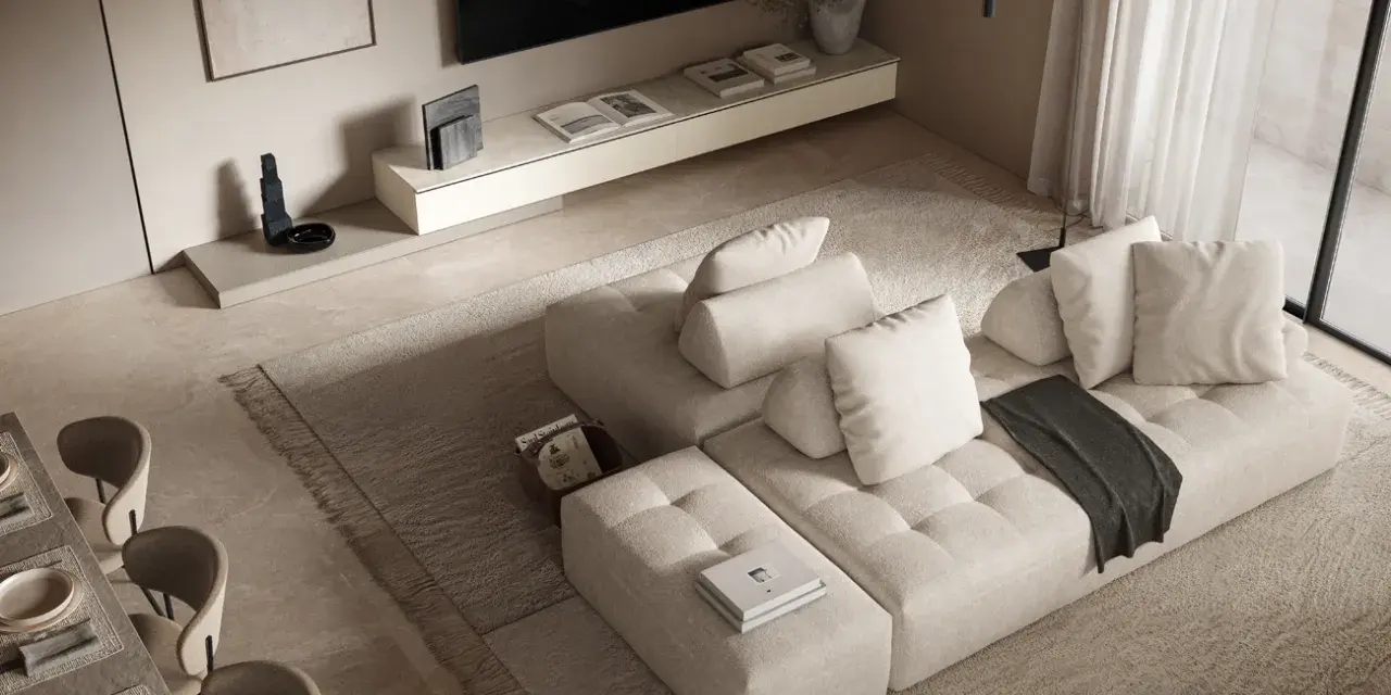 Soggiorno con divano componibile beige, tappeto a pelo lungo e un tavolo da pranzo. L'arredamento minimalista crea un'atmosfera serena.