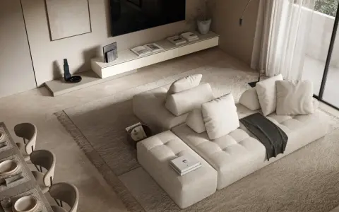 Soggiorno con divano componibile beige, tappeto a pelo lungo e un tavolo da pranzo. L'arredamento minimalista crea un'atmosfera serena.