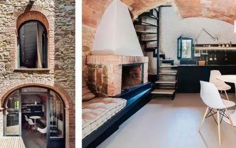 Interno di piccole case in pietra con camino, scala a chiocciola e cucina moderna. Esterno con finestre ad arco in pietra e mattoni.