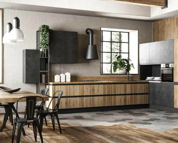 Cucina moderna con un accogliente stile industriale casa. Legno, metallo e cemento si fondono in un ambiente di design.