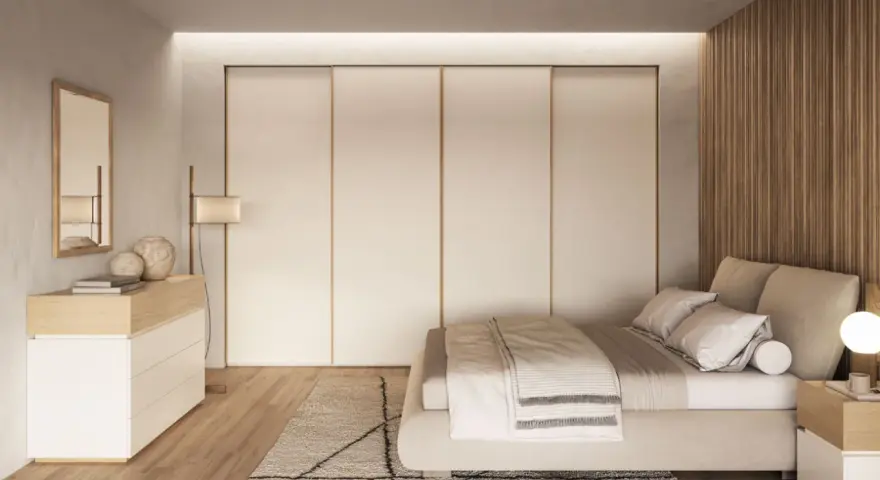 Camera da letto in stile nordico con letto accogliente, armadio a scomparsa e comò in legno chiaro.