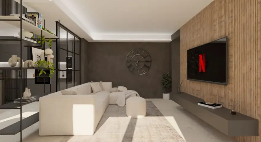 Accogliente soggiorno stile industriale con divano bianco, libreria metallica e TV su parete in legno.