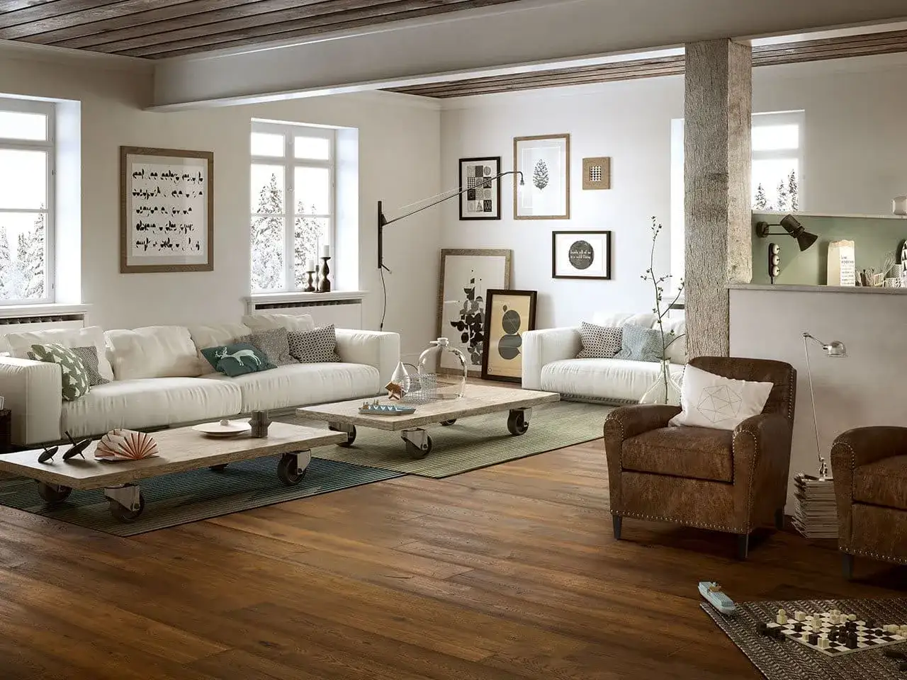 Living room with white sofas, brown leather armchair, wooden floors, and rustic ceiling beams.