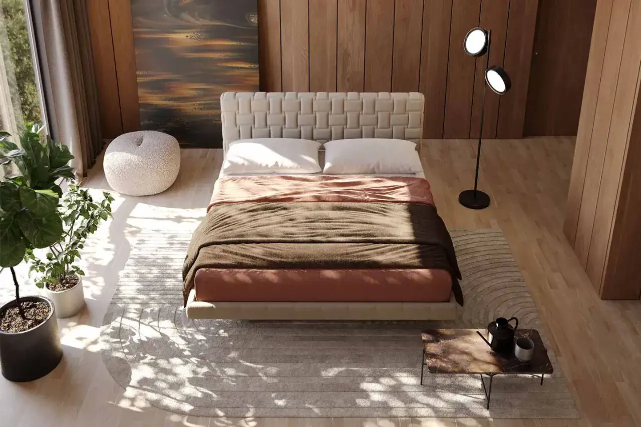 Camera mostra diversi tipi di letto matrimoniale in una stanza moderna con pareti in legno e un quadro astratto.