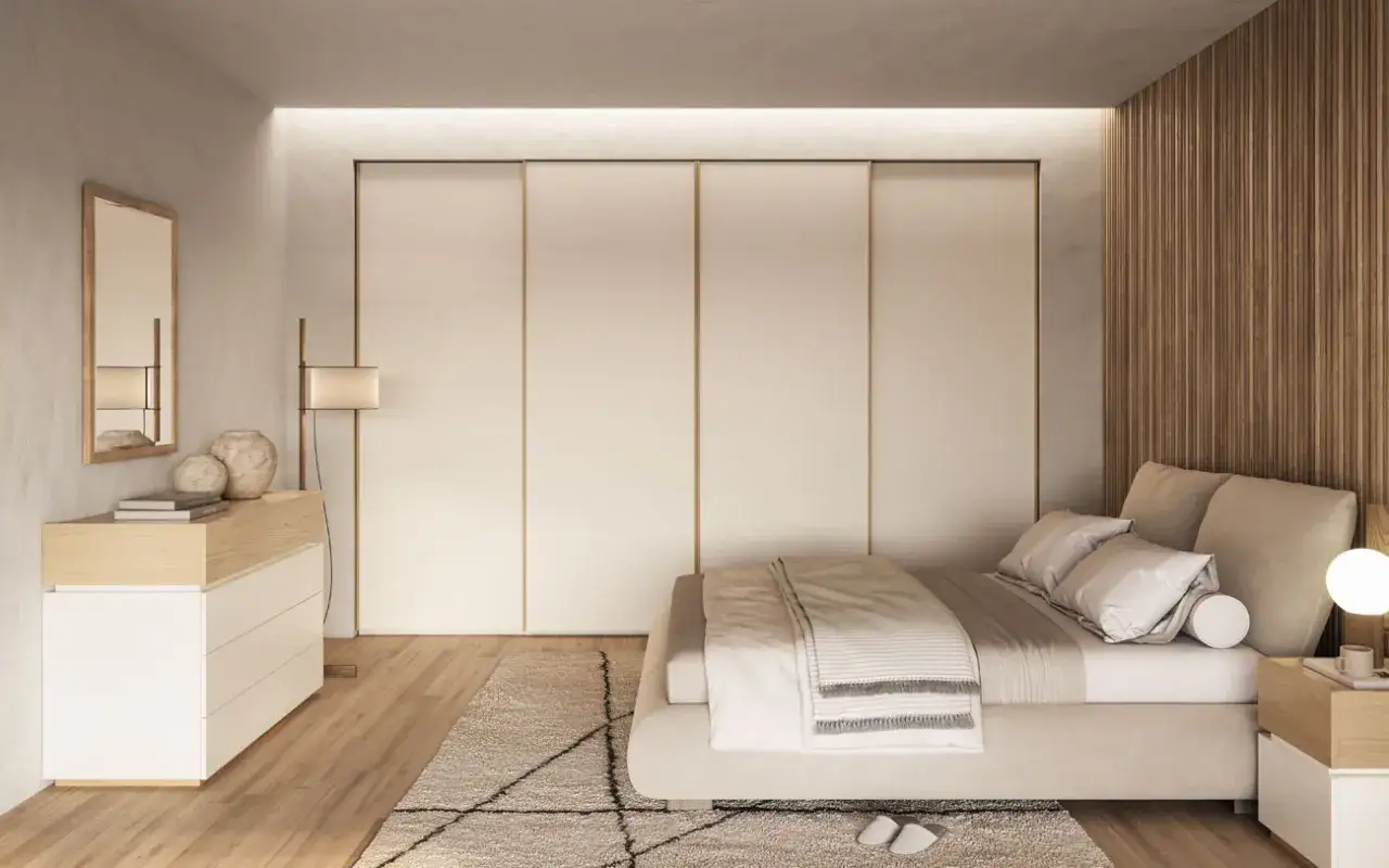Camera da letto in stile nordico con letto accogliente, armadio a scomparsa e comò in legno chiaro.