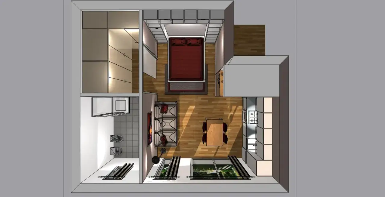 Pianta di un monolocale di 20 mq: letto, zona giorno con tavolo e sedie, cucina e bagno separati.